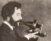 1876_Bell_Speaking_into_Telephone.jpg (73577 bytes)