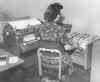 Secretary_with_Bookkeeping_Machine.jpg (87626 bytes)